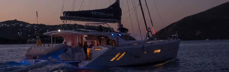 A view of a semi-customised yacht by dusk