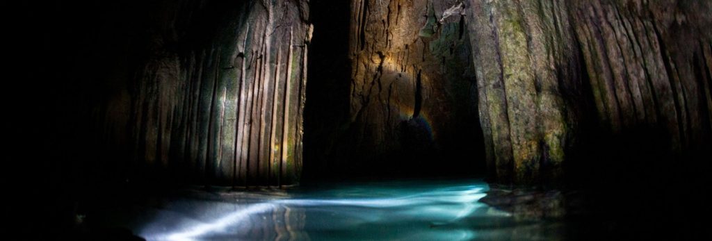 Raja Ampat Discover the magical serenity of the Tomolol Cave System.